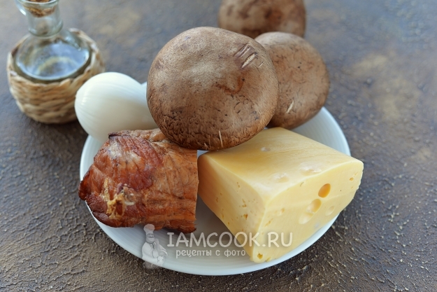 Грибы, фаршированные копченым мясом, в духовке