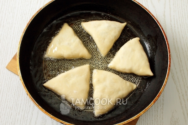 Place the pies in a frying pan with butter